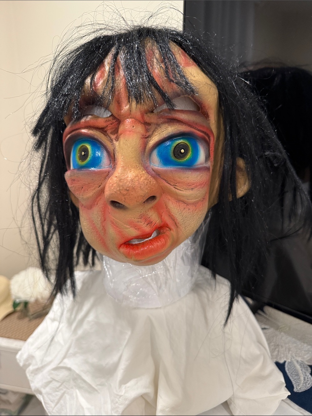 Creepy Puppet Head Toy - Black Hair, Blue Eyes